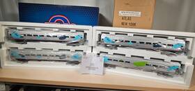 3007086 Atlas O Premier Amtrak Phase V 50th Anniversary Amfleet 4-car Set Mint