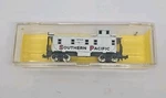 Atlas 3561 N-scale Southern Pacific Caboose #1064 With Case New. Fixed Price $19.49.