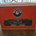 Lionel British Columbia Railway Log Dump Car Gauge 6-36812. Fixed Price $30.00.