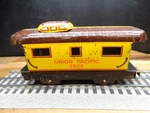 Marx O27 Gauge Metal Worn Yellow & Brown Union Pacific 3824 Cupula Caboose. Fixed Price $12.00.