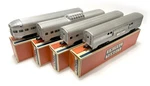 Postwar Lionel Large Streamline Passenger Car Set 2530, 2533, 2532, 2531. Fixed Price $475.00.