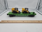 Menards Gauge Burlington Northern Flat Car With 2 Skid Loaders. Fixed Price $25.00.