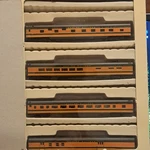 Con-cor Empire Builder 5 Car Passenger Set Great Northern Gauge Orange Black. Fixed Price $259.53.