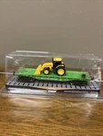 Menards Burlington Northern Flatcar With Tractor Load. Fixed Price $32.00.