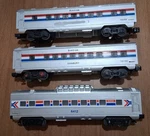 3 Lionel Amtrak Cars. Fixed Price $75.00.
