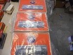 Lionel 6-26883#117, 6-26888#115, 6-26889#116- Weyerhaeuser Log Dump Cars New/obs. Fixed Price $99.00.