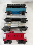 5 Lionel Gauge Model Railroad Freight Cars ( Sunoco Tankers Gondolas Caboose). Fixed Price $30.00.