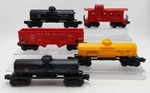 Lionel Vintage Gauge Assorted Freight Cars: 6476, 6025, 6257 & 6015. Fixed Price $24.00.