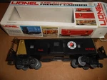 O/O-27 Lionel 9268 Northern Pacific Bay Window Caboose Box. Light Works.. Fixed Price $18.00.