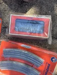 Lionel Train Multicolor Plastic Track, Cars, Telephone Poles Lot. Fixed Price $850.00.