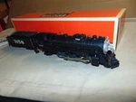 Lionel 18034 Santa Fe 2-8-2 Steam Engine With Smoke & Sound + Box. Fixed Price $195.00.
