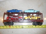 O/O-27 Mth 30-7628 Carrier With 4 Ertl Cars. 1 Coupler Broke. No Box. As Is.. Fixed Price $26.00.