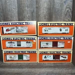 Lot Of Six (6) Lionel Christmas Themed Box Cars Gauge. Fixed Price $199.99.