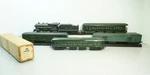 Trix HO/00 9/525 Us Passenger Loco, Coaches And Baggage Cars, C-7 Condition. Fixed Price $105.00.