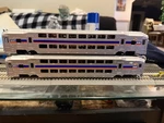 2-HO Scale New Atlas Custom Painted Marc Multi Level Commuter Cab Car And Coach. Fixed Price $255.99.
