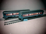 Two Lionel Polar Express Illuminated Passenger Cars Puppet Silhouettes .. Fixed Price $70.00.