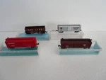 Atlas N-scale Set Of 4 Freight Cars New. Fixed Price $35.00.
