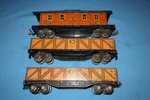 Lionel #1717 Prewar Gauge Tin Litho Gondola Cars & #1722 Caboose. Fixed Price $22.45.