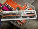 Lionel 6-8307 Gauge Southern Pacific Daylight Steam Locomotive & Tender. Fixed Price $350.00.