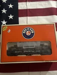 Lionel British Columbia Log Dump Car. Fixed Price $30.00.