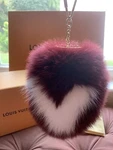 Louis Vuitton Amarante Fox Fur Fuzzy Bag CHARM-CX1115. Fixed Price $750.00.