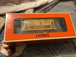 Lionel 6-17801 Cn Canadian National Yellow Ore Car 2000. Fixed Price $50.00.