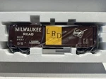 Line Scale 761-1374 Milwaukee Road Boxcar #2933. Fixed Price $44.99.