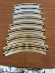 (8 New) Lionel 036 Fastrack Gauge Full Curve 3-RAIL System. Fixed Price $46.00.