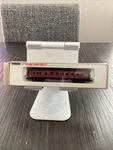 Arnold Rapido 0337 Gauge Passenger Car Red/black. Fixed Price $26.00.