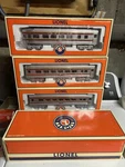Lionel 6-21973 Santa Fe Illuminated Passenger Cars- Red/silver 0-27 Scalep. Fixed Price $99.00.
