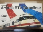 Ho Scale - Rapido Rohr Turbotrain Amtrak X2000 Demonstrator Set #25506. Fixed Price $575.00.
