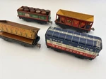 1930S Marx Train Wheel Lithographed Boxcars 4497, 552, 554, 567. Fixed Price $45.00.