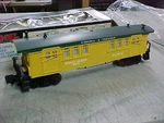 Lionel #6-16012 Gauge Virginia & Truckee Yellow Baggage Car. Fixed Price $65.00.