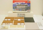 Walthers 933-3312 / O-27 Gauge Krazy Ken's Car Town Building Kit. Fixed Price $63.74.