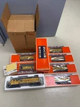Lionel Gauge Union Pacific Smooth Side Passenger Set With DASH-8 40C Locomotiv. Fixed Price $499.99.