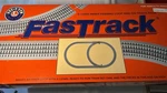 Lionel Fastrack Inner Passing Loop 6-12028 With Box. Fixed Price $50.00.