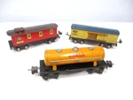 Lionel 1679, 1680X, 1682 Litho Freight Cars Prewar Gauge X7382. Fixed Price $39.00.