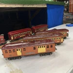 Lionel 1766/1767/1768 Prewar Standard Gauge Two-tone Terra Cotta Passenger Cars. Fixed Price $594.99.
