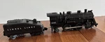 Lionel Lines 1061 Gauge Black Steam Locomotive With Tender. Fixed Price $24.99.