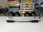Lionel 26053 Pennsylvania #353381 Gondola W/4 Prr Canisters O/027 Ln/unboxed. Fixed Price $20.00.