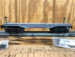 Lionel 6-16963 Corporation Flatcar 6411. Fixed Price $35.00.