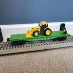 Menards 2015 Goldline Collection Burlington Northern Flatcar W/ Tractor Load New. Fixed Price $19.95.