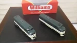 Williams Northern Pacific F7 Diesel Engine With Lionel Six Car Passenger Set. Fixed Price $575.00.