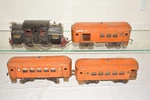 Lionel Prewar Standard Gauge #38, 31, 34, 35 Orange Passenger Set Bch. Fixed Price $350.00.