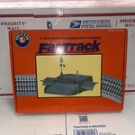 Lionel Fastrack 6-12052 Grade Crossing With Flashers -new- Open Box. Fixed Price $50.00.