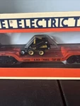 Lionel 6-16958 Flatcar With Ertl New Holland Loader 1996 In Box. Fixed Price $25.00.