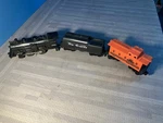 Lionel 1061 Locomotive With Tender And Caboose - Tested. Fixed Price $25.00.