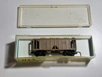Vintage By Deluxe 7140 Scale Bay Covered Hopper Missouri Pacific #2102 Tan. Fixed Price $12.00.