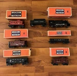 Lionel Gauge #1130 Steam Engine Locomotive & 6 Single Cart With Original Boxes. Fixed Price $185.00.