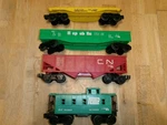 4-LIONEL O-gauge Freight Car---see Listing For Info.. Fixed Price $12.00.